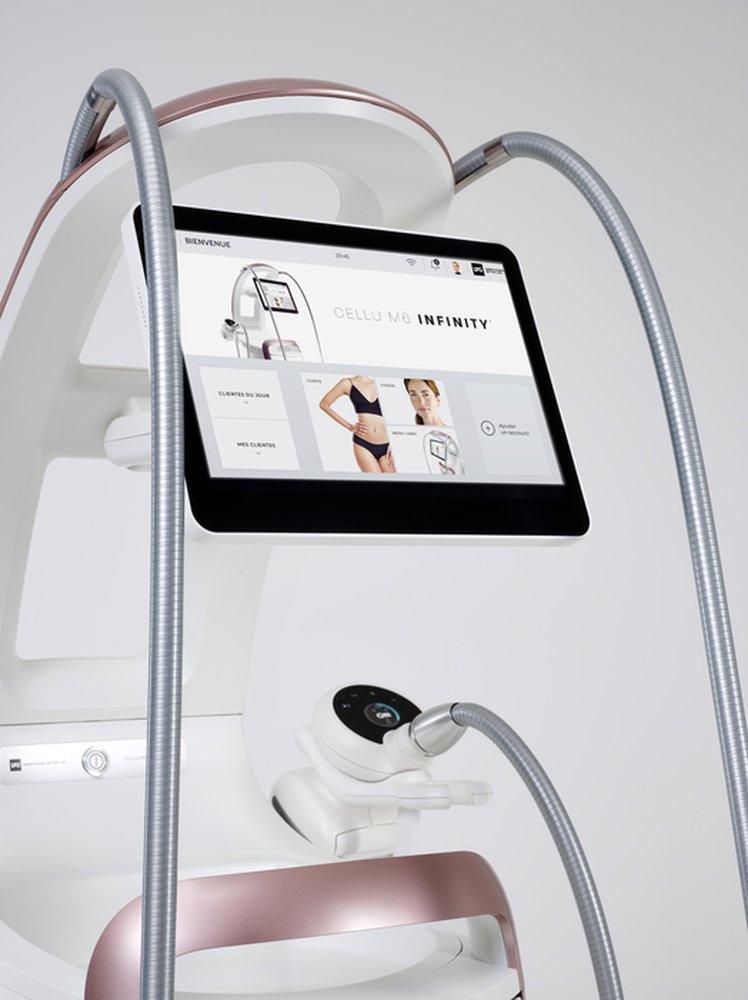 The LPG Cellu M6 Infinity Endermologie machine, showing its touchscreen console and two flexible treatment arms.